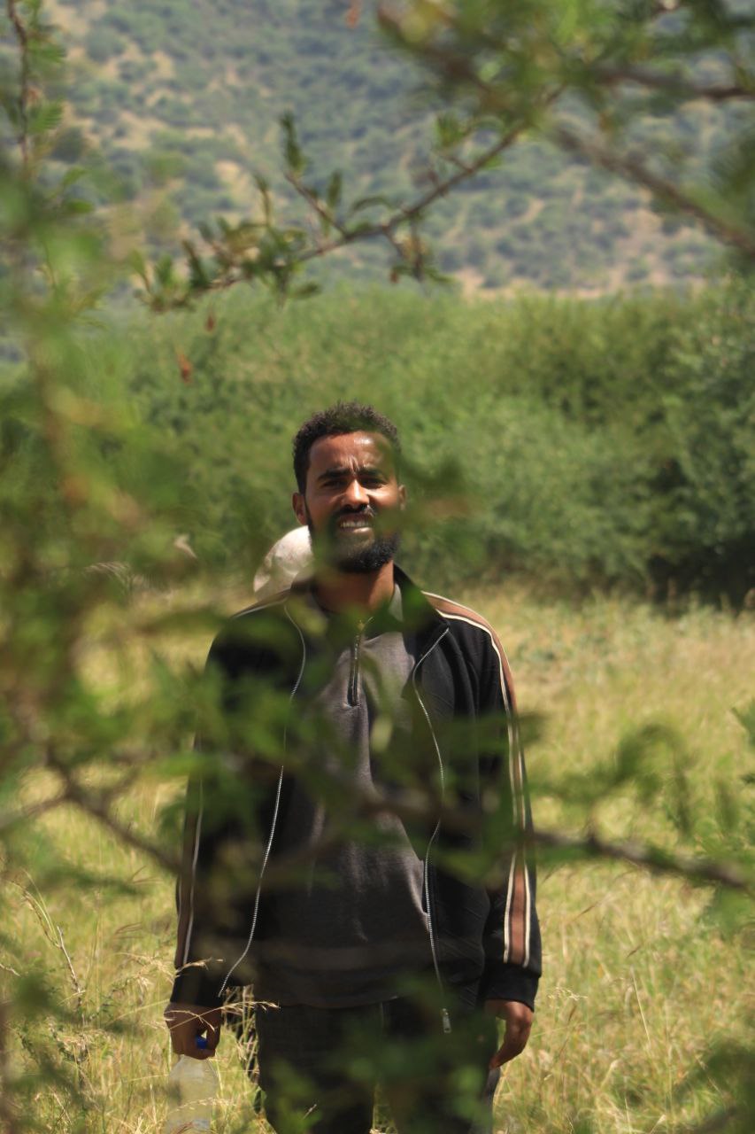Field portrait representing Gech M.